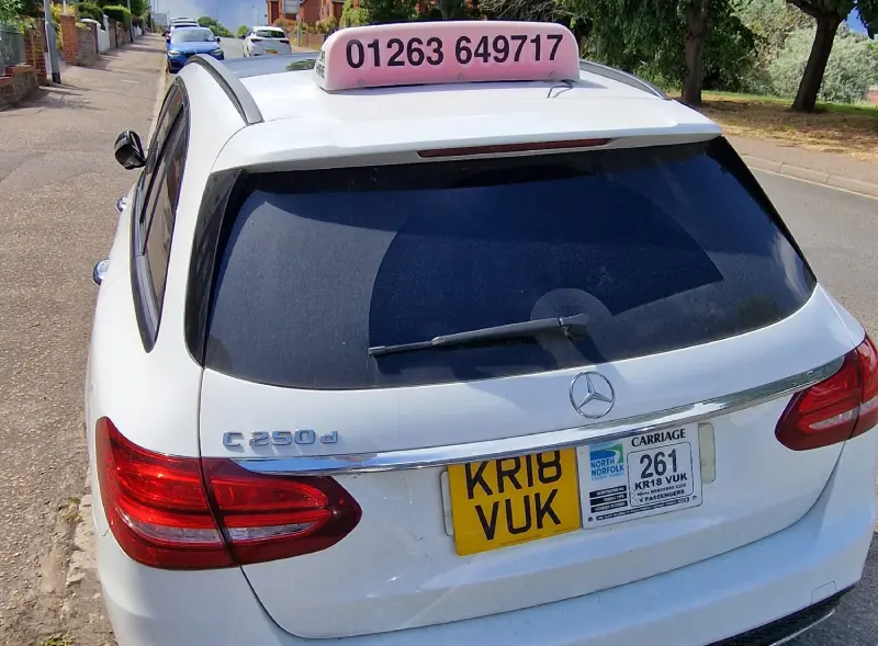 Sheringham airport transfer taxi by Top Taxi Norfolk